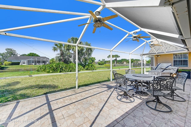 818 Spanish Wells Dr, Melbourne, FL 32940 - view of patio with a ceiling fan, a lanai, and outdoor dining space
