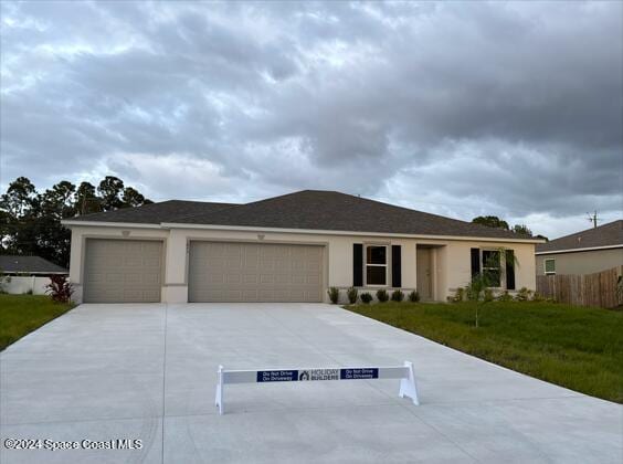 ranch-style house with a garage