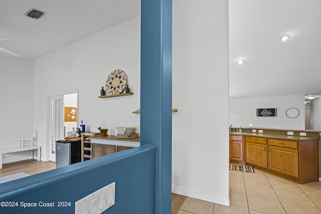 interior space featuring light tile patterned flooring