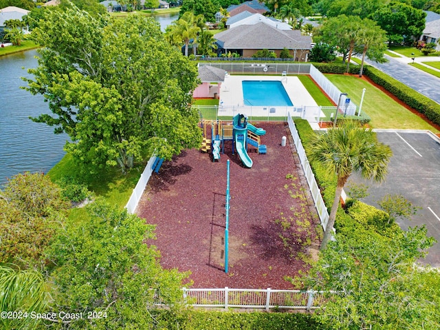 birds eye view of property featuring a water view