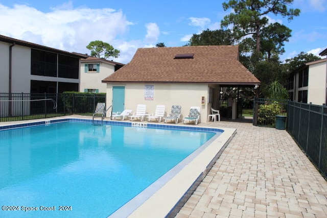 view of pool featuring a patio area