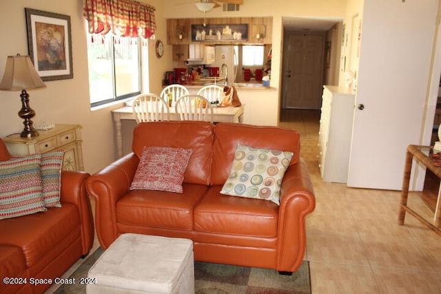 living room featuring ceiling fan