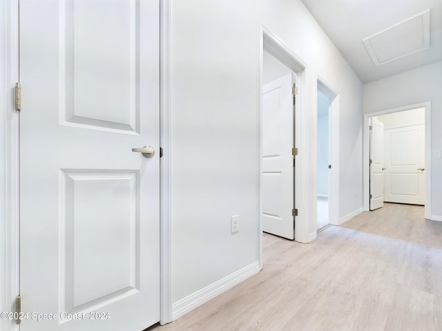 3143 Fullerton Ave SW, Palm Bay, FL 32908 - hall with light wood-style flooring and baseboards
