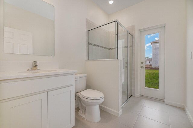 bathroom featuring a healthy amount of sunlight, toilet, and an enclosed shower