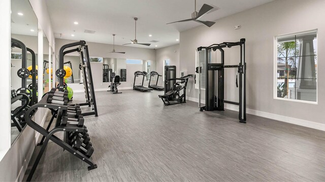 workout area with ceiling fan