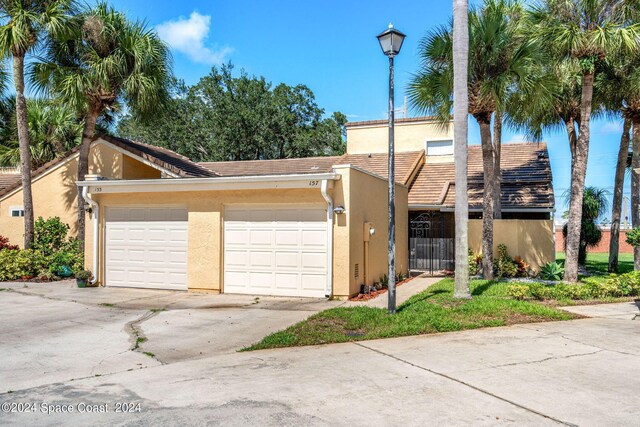 view of front of home featuring a garage