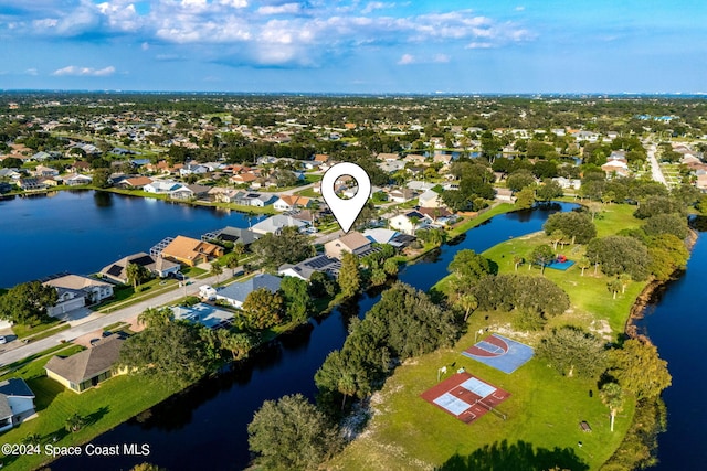 aerial view with a water view and a residential view