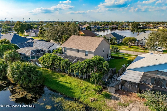 aerial view with a water view and a residential view