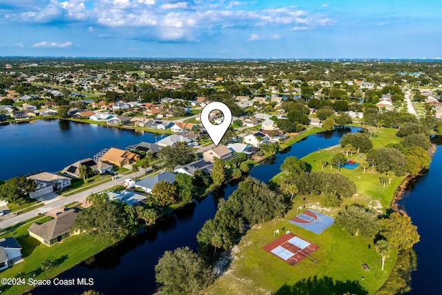 bird's eye view with a water view