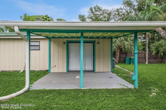 view of outdoor structure featuring a lawn