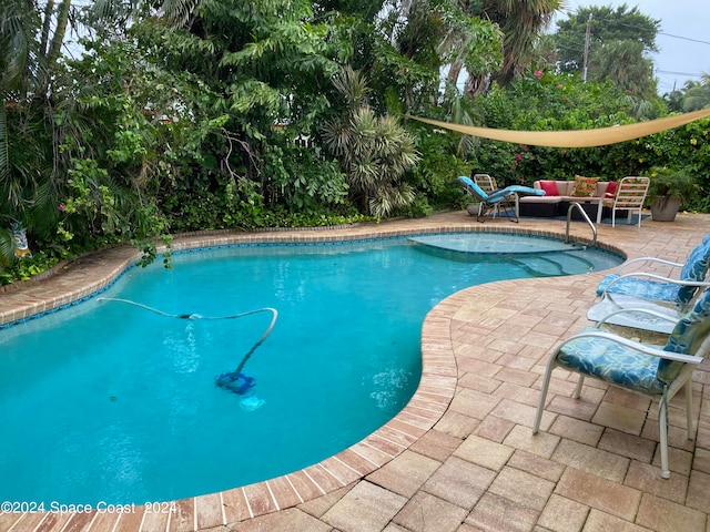 view of swimming pool featuring an outdoor hangout area and a patio