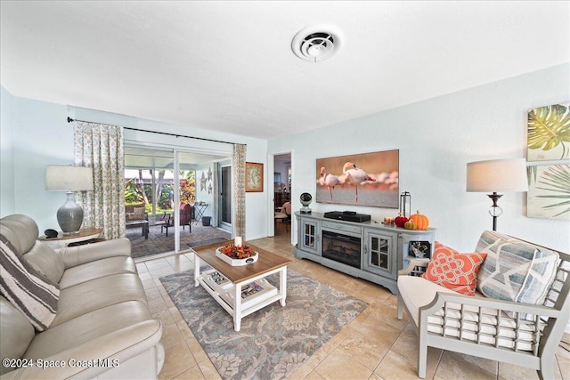 living room featuring light tile patterned flooring