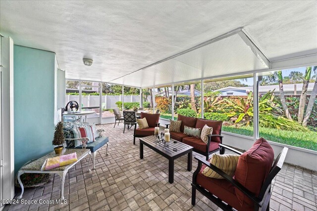 sunroom featuring plenty of natural light