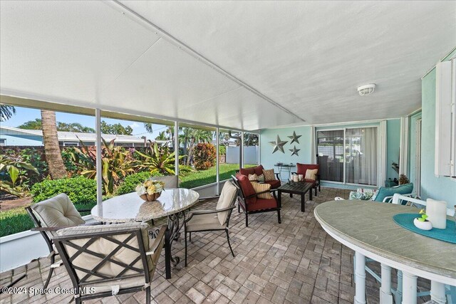 sunroom / solarium with a healthy amount of sunlight