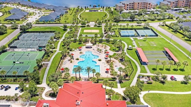 birds eye view of property with a water view