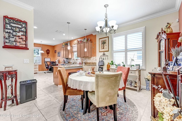 tiled dining area featuring ornamental molding and a chandelier