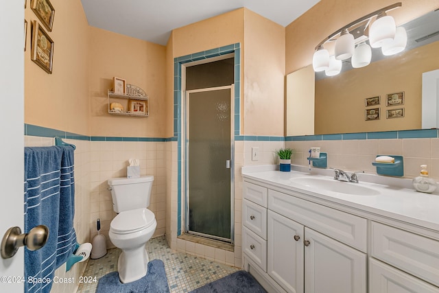 bathroom with tile walls, an enclosed shower, and toilet