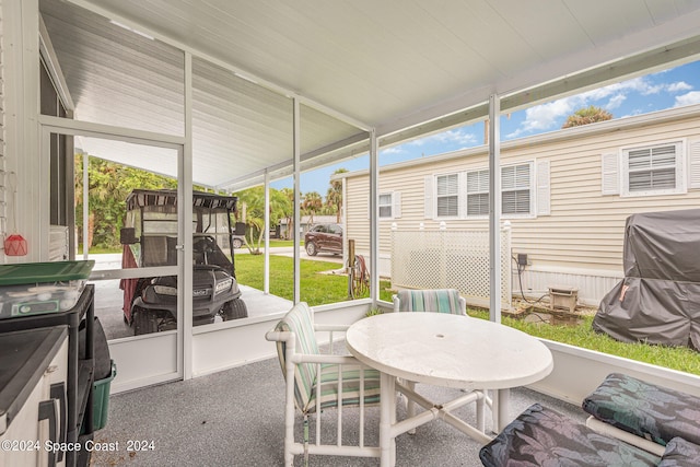 sunroom / solarium with plenty of natural light