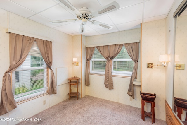 bathroom with ceiling fan and a paneled ceiling