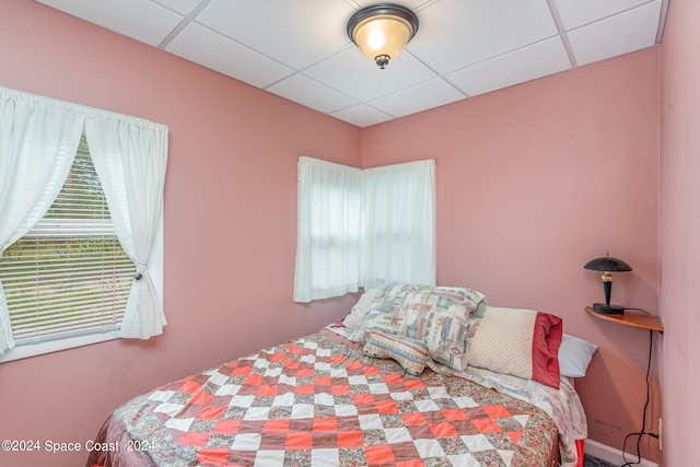 bedroom with a drop ceiling