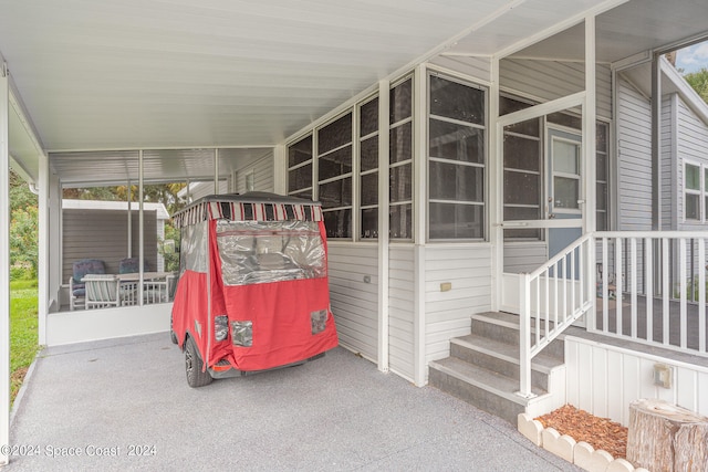 view of patio featuring a carport