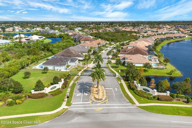 drone / aerial view featuring a water view