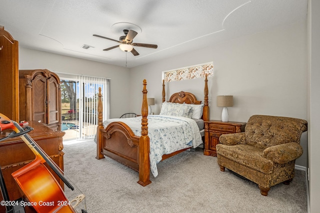 bedroom with access to outside, a textured ceiling, light carpet, and ceiling fan