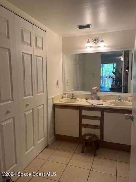 bathroom featuring vanity and tile patterned floors