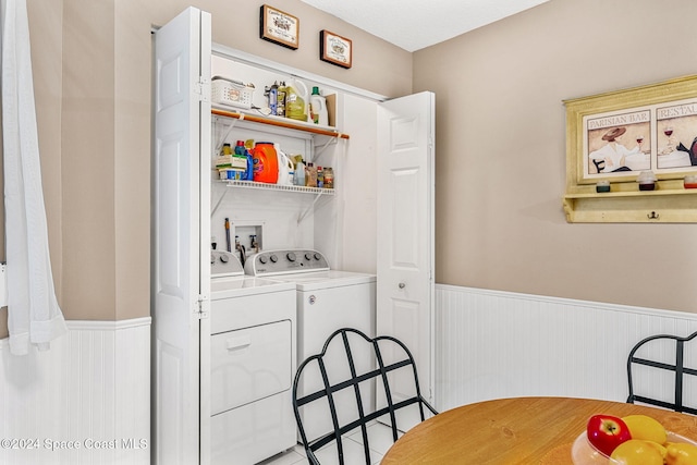 washroom featuring separate washer and dryer