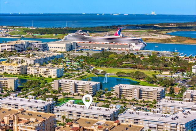 birds eye view of property featuring a water view