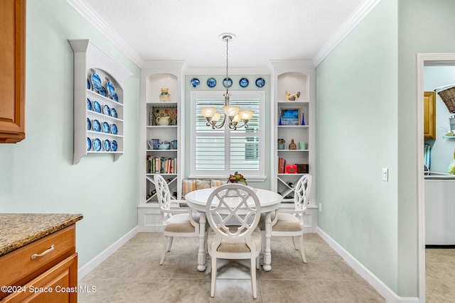 dining space featuring ornamental molding, light tile patterned flooring, a textured ceiling, and an inviting chandelier