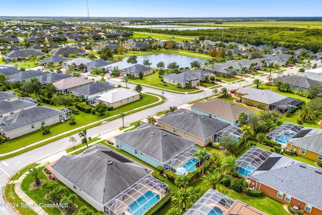 drone / aerial view featuring a water view