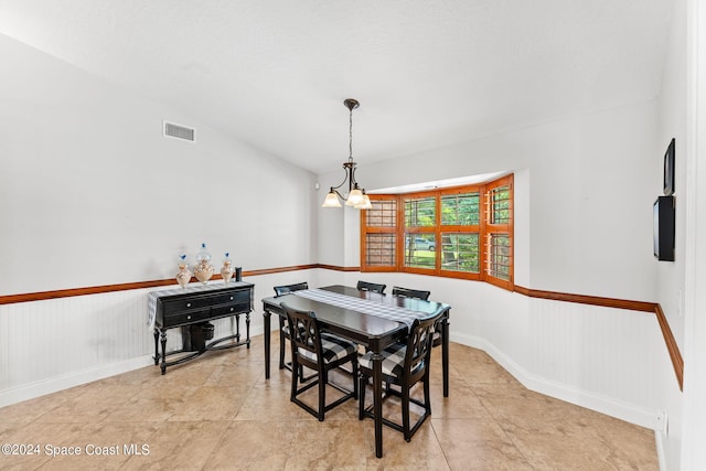 dining room with an inviting chandelier