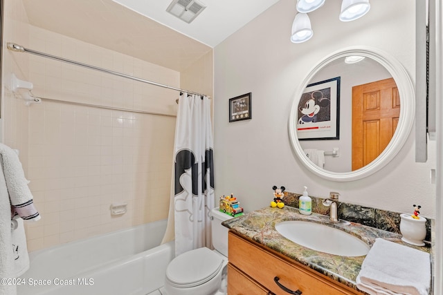 full bathroom featuring toilet, shower / bath combo, and vanity