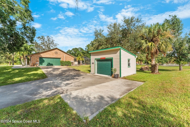 garage with a yard