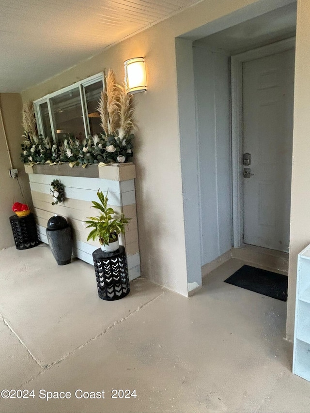 interior space featuring concrete flooring