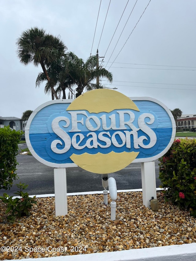 view of community sign