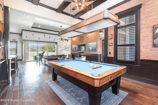 rec room featuring beamed ceiling, brick wall, pool table, and dark hardwood / wood-style flooring