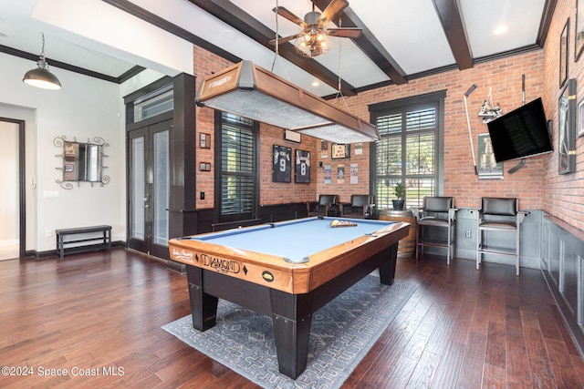 recreation room featuring pool table, dark hardwood / wood-style floors, beamed ceiling, and brick wall