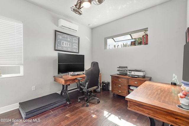 office space with a wall unit AC and dark hardwood / wood-style flooring