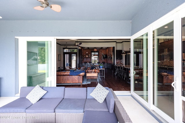 view of patio featuring outdoor lounge area and ceiling fan