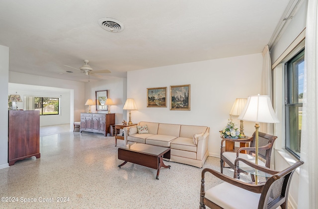 living room with ceiling fan