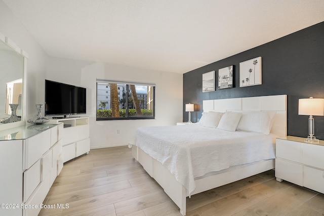 bedroom featuring light hardwood / wood-style flooring