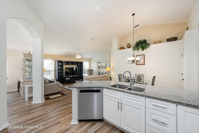 4889 Worthington Cir, Rockledge, FL 32955 - kitchen with ceiling fan with notable chandelier, a sink, white cabinets, dishwasher, and light stone counters