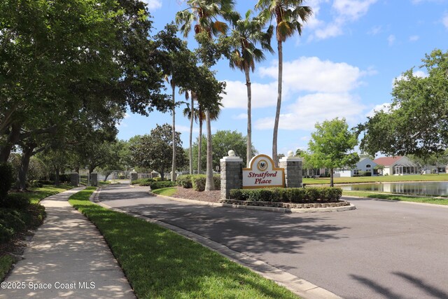 4889 Worthington Cir, Rockledge, FL 32955 - view of road with a water view, curbs, a residential view, and sidewalks