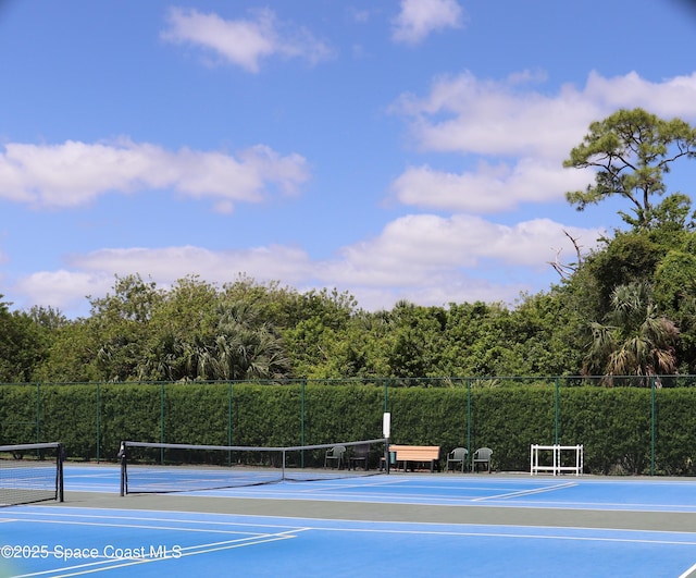 4889 Worthington Cir, Rockledge, FL 32955 - view of tennis court featuring fence