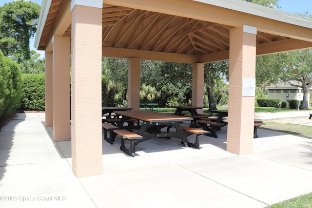 4889 Worthington Cir, Rockledge, FL 32955 - view of property's community with a patio area and outdoor dining space