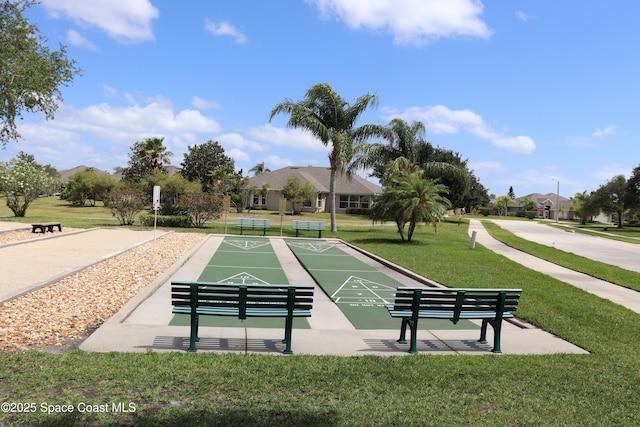 4889 Worthington Cir, Rockledge, FL 32955 - view of home's community with shuffleboard and a lawn
