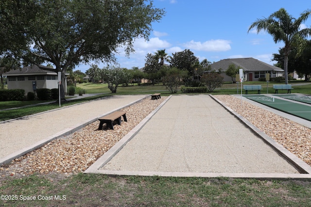 4889 Worthington Cir, Rockledge, FL 32955 - view of home's community with shuffleboard and a yard