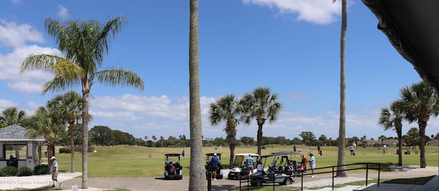 4889 Worthington Cir, Rockledge, FL 32955 - surrounding community with view of golf course and a lawn